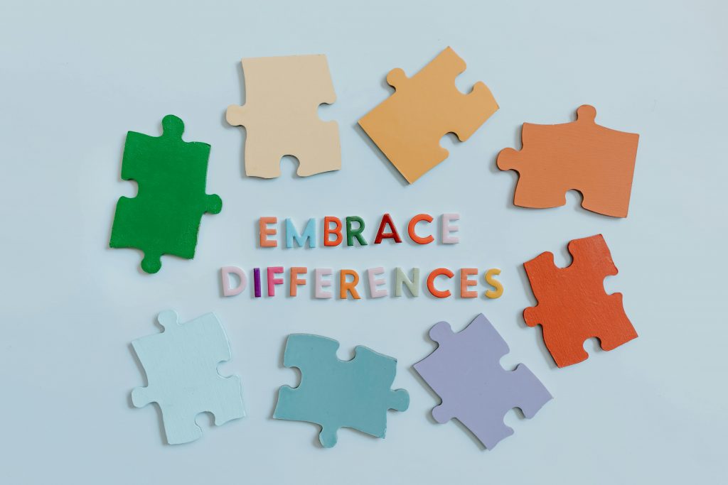 Embrace Differences Colorful Puzzle as we embrace differences in our autism parent coaching at Tender Transitions.