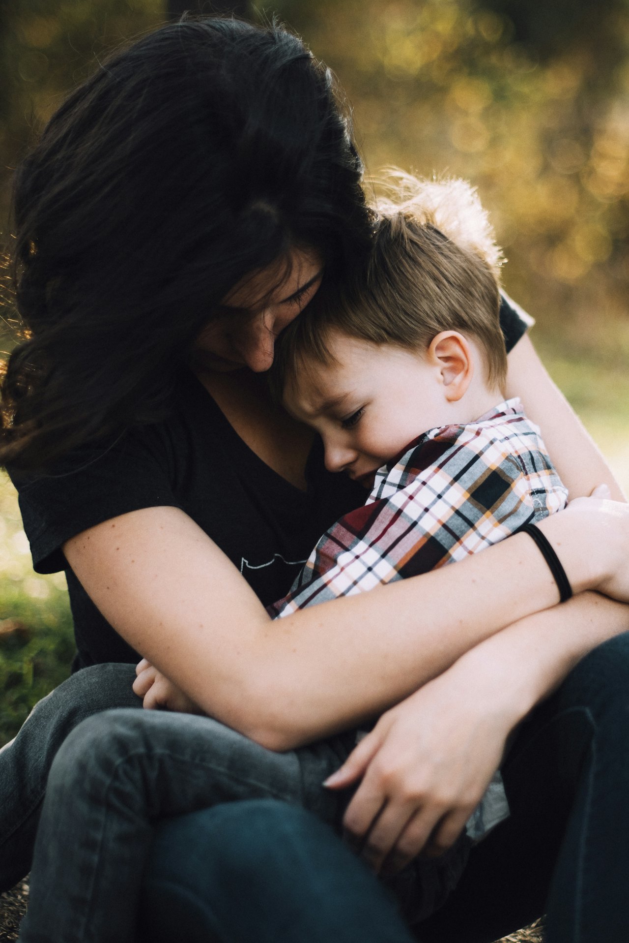A picture of a mother hugging her son.